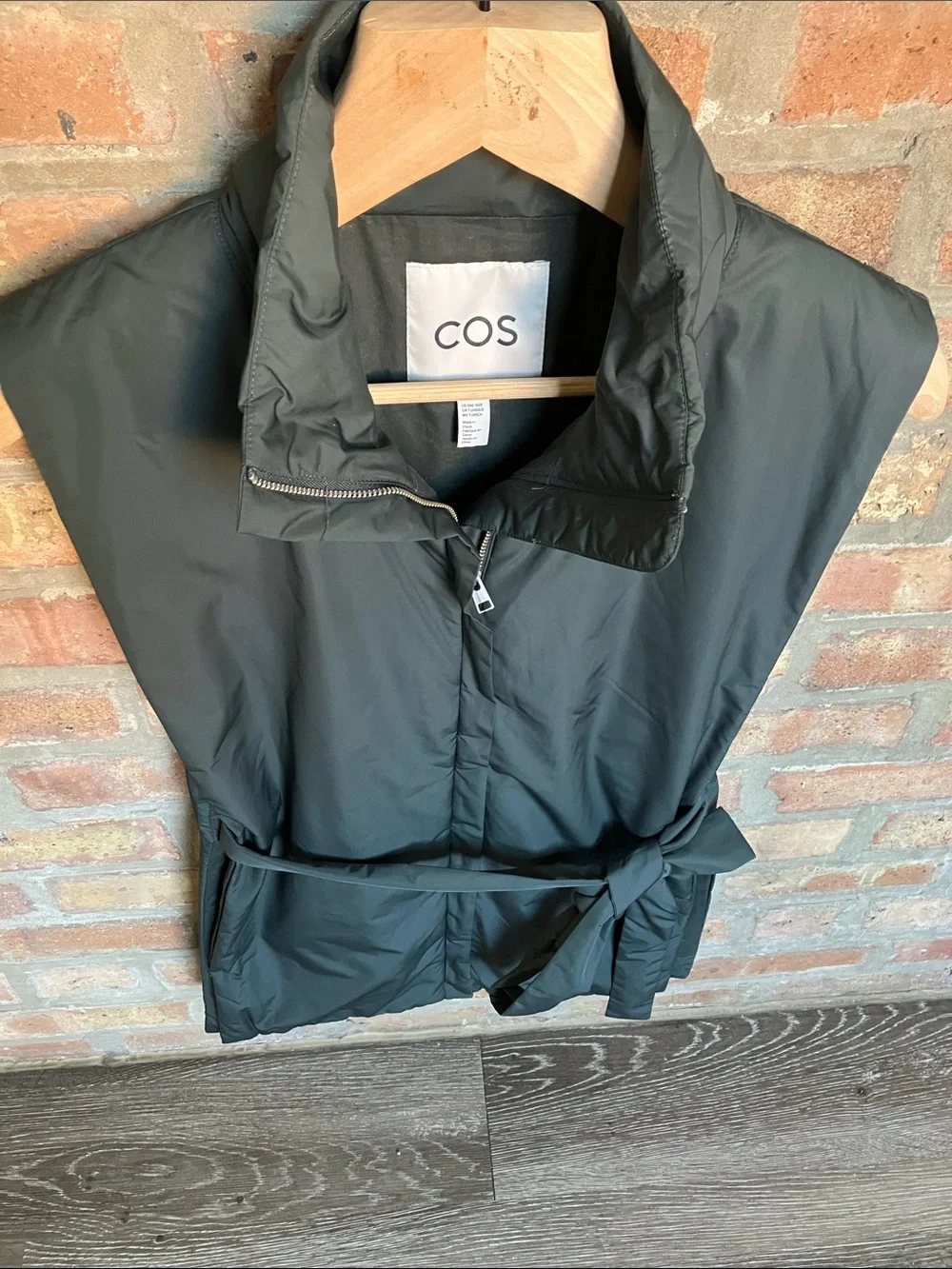 dark green COS high-neck padded vest